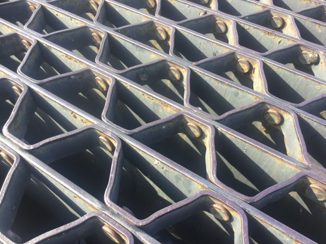 A particularly heavy-duty grate covering a storm drain in Sarasota, FL. (2017)