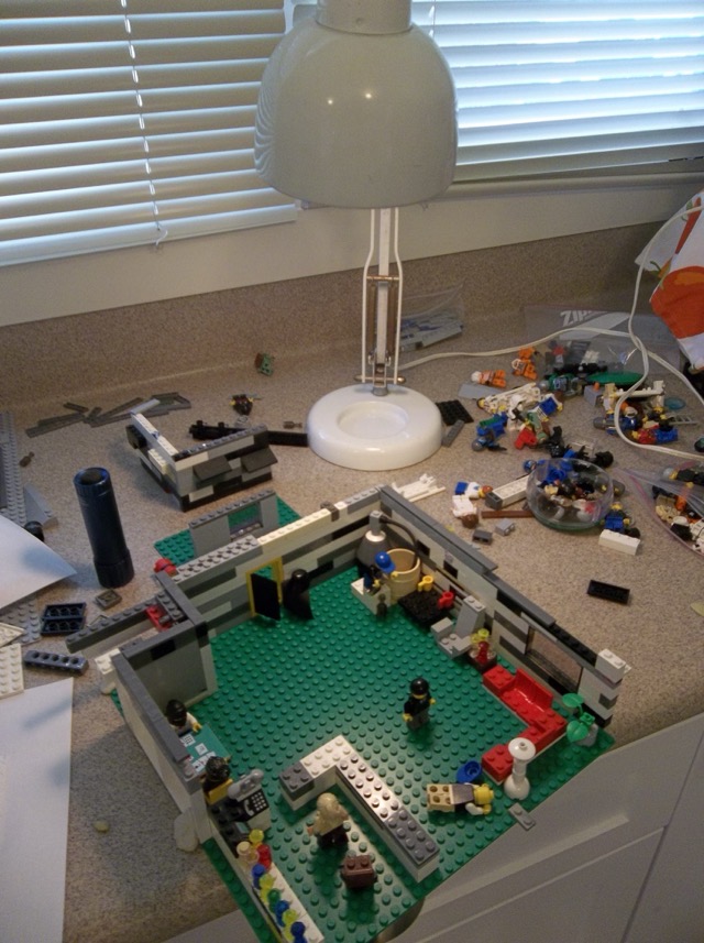 The gang's hideout, a studio apartment converted into a hive of scum and villainry.