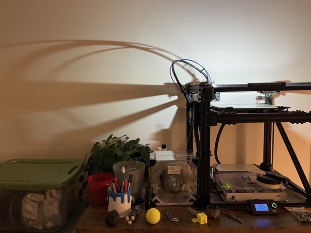 A small work lamp resting on the frame cast a mesmerizing, moving shadow on the wall behind. (2023)