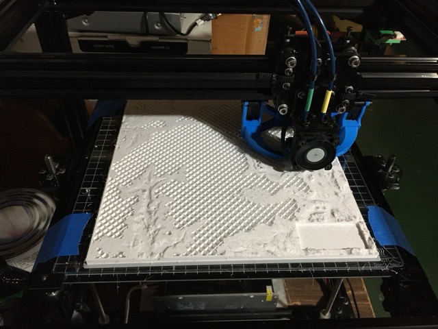 Testing out a custom script to use the dual-extrusion hardware to build a 3D topographic contour map. (2021)