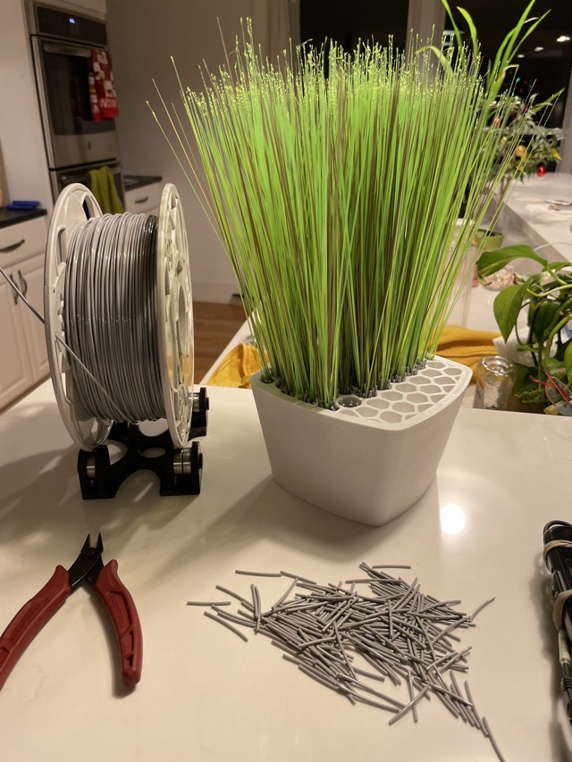 Using a load of purge lines to mimic the blades of something like lemongrass.  This was a phenomenal waste of time, but at least the final results were pretty. (2021)
