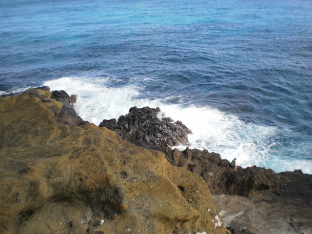 Only part of the shoreline was beaches.  Everywhere else, waves crashed against hard volcanic rock. (2011)