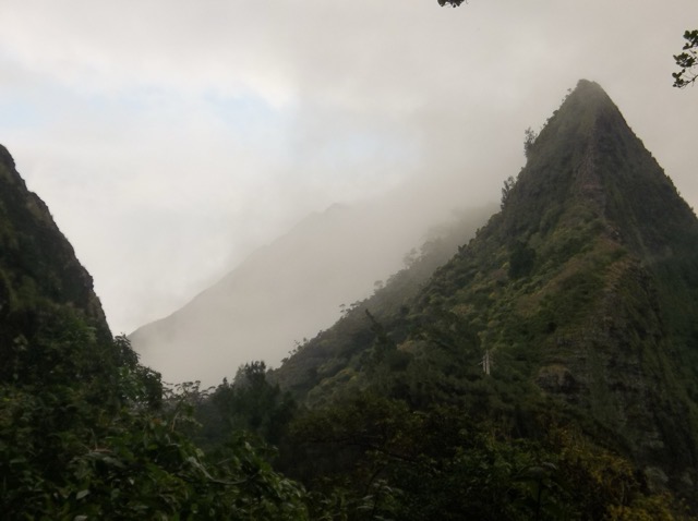 Fog pours over the top of the Ko'olau mountain range. (2014)