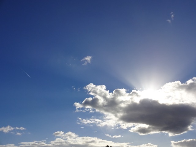 The powerful tropical sun spills out from behind a cloud. (2015)